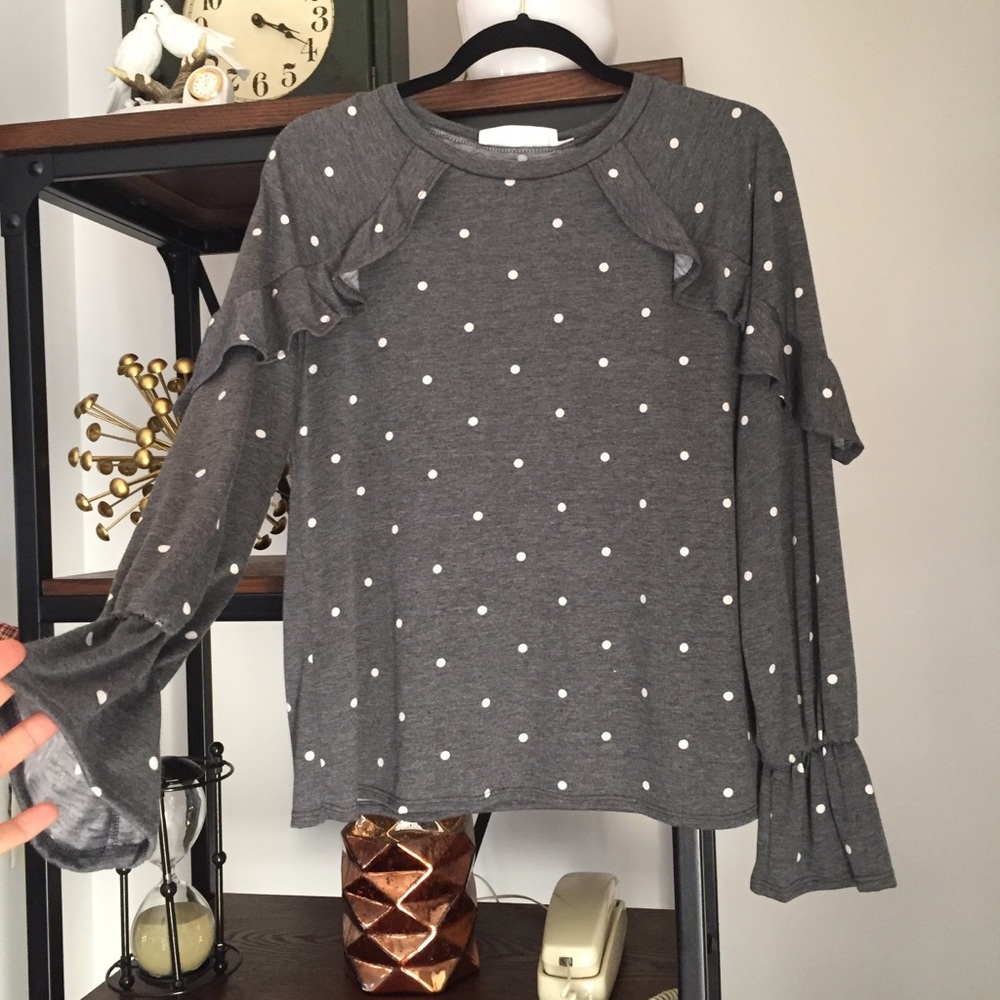 A. Ok coevolution  gray and withe dot sweater